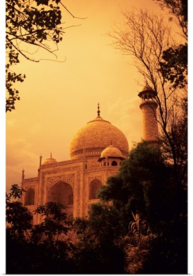 India, Taj Mahal At Dusk, Orange Skies And Dark Trees