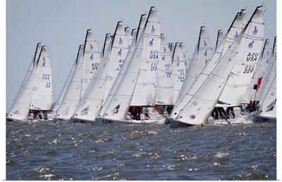 J-70 sailboats on the starting line of a regatta on the Chesapeake Bay near Annapolis, Maryland.; Chesapeake Bay, Maryland.