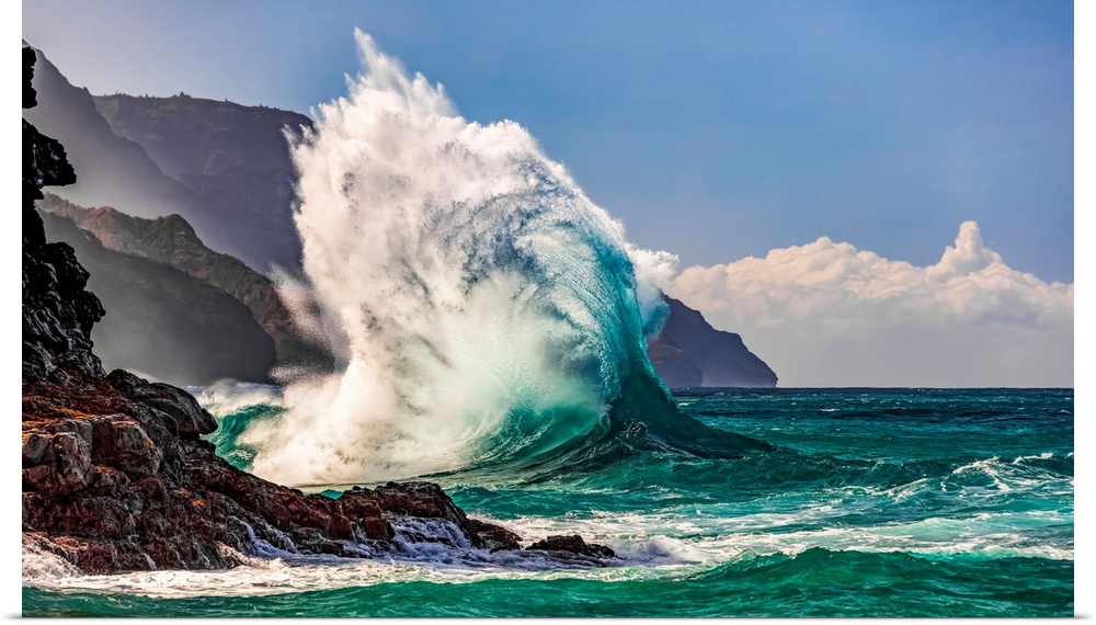 Large waves crashing along the rugged coastline of the Na Pali coast at Ke'e beach, Kauai, Hawaii, united states of America.