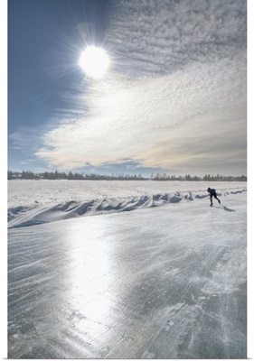 Lone Speed Skater On Sylvan Lake, Alberta, Canada