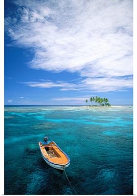 Micronesia, Small Boat In Turquoise Waters Off Small Island With Palm Trees