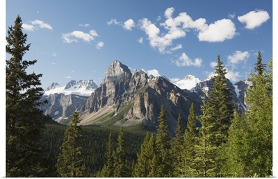 Mountain Vista With Cliff Face And Blue Sky And Clouds; Alberta, Canada