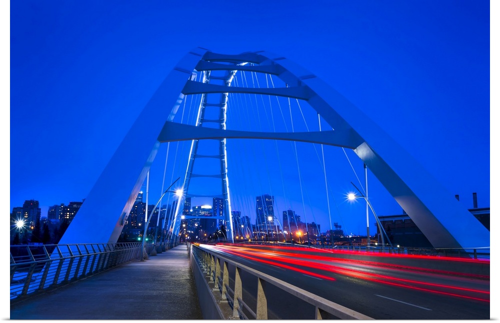 A night shot of the New Walterdale Bridge in downtown Edmonton; Edmonton, Alberta, Canada