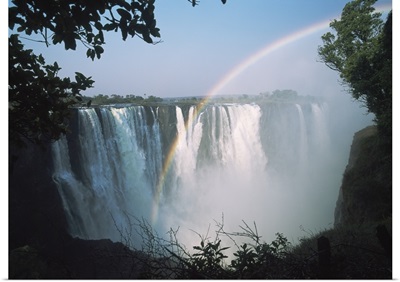 Rainbow In Front Of Victoria Falls; Zimbabwe