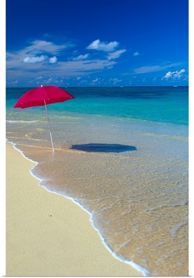 Red Beach Umbrella In Shore Waters