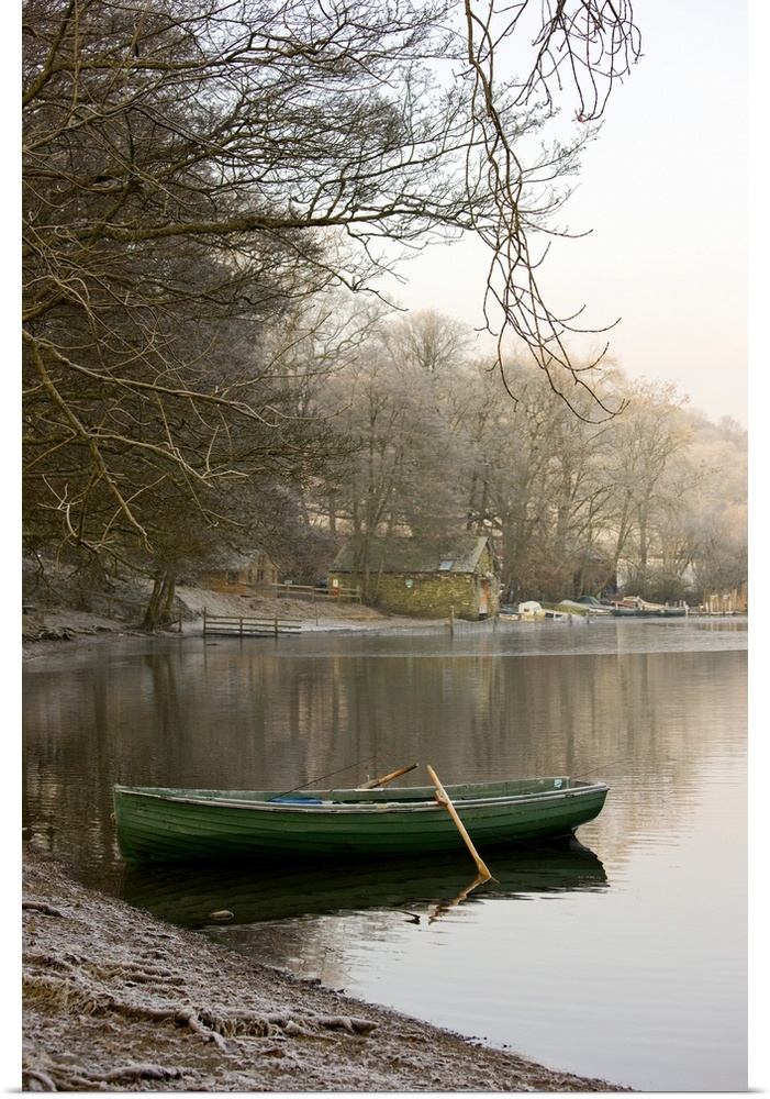 Rowboat Sitting At The Shore Of A Lake, Cumbria, England