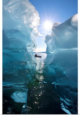 Sea Kayaker Views Large Icebergs In Stephens Passage, Southeast Alaska