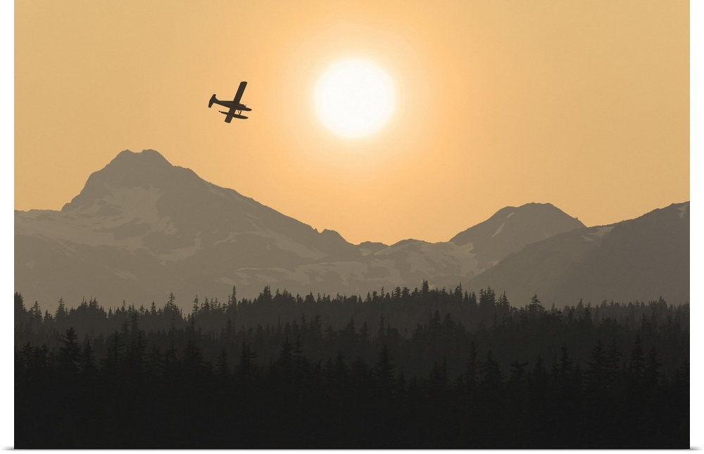 Silhouette Of A Floatplane In Flight Over The Chilkat Mountains At Sunset, Tongass National Forest, Alaska