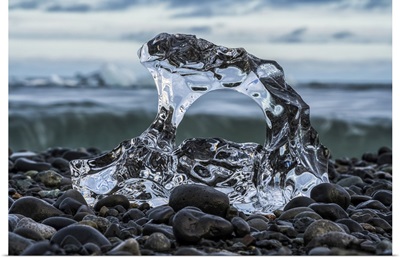 Small Piece Of Melted Glacial Ice On The Shore Of The Ocean Near Jokulsarlon, Iceland