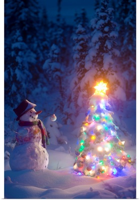 Snowman stands in a snowcovered spruce forest next to a decorated Christmas tree