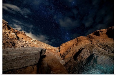 Stars In The Night Sky Above A Rocky Ravine In The Atacama Desert, Chile