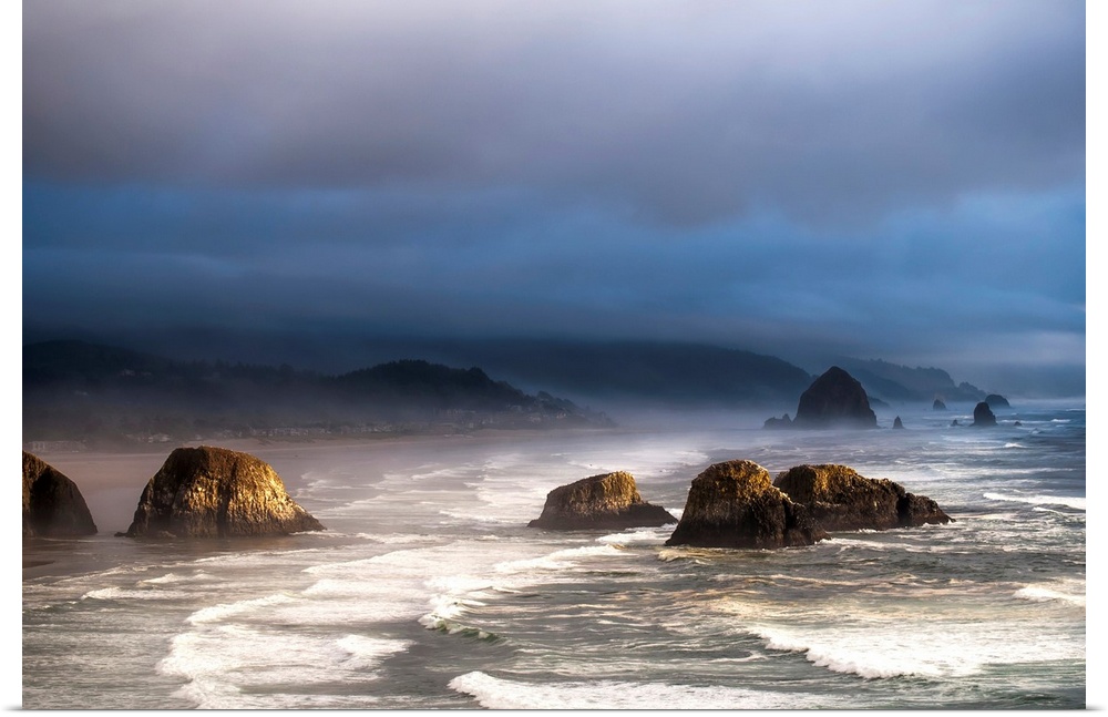 Sunlight and mist create coastal moods. Cannon Beach, Oregon, United States of America.