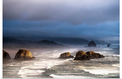 Sunlight and mist create coastal moods, Cannon Beach, Oregon