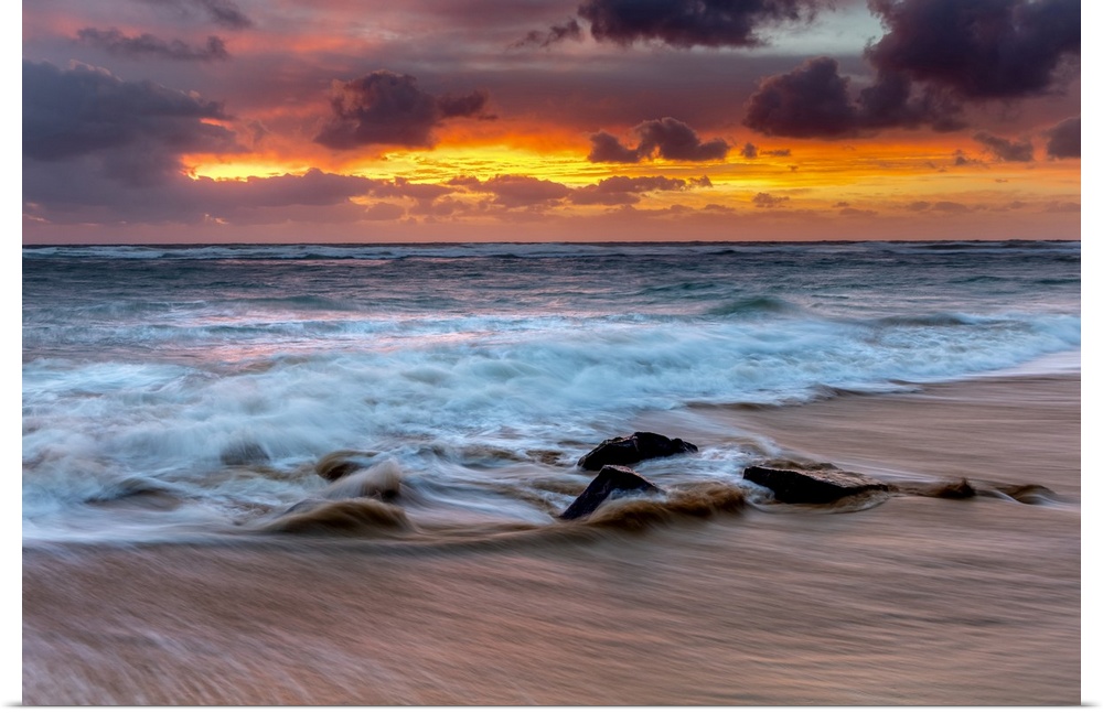 Sunrise on the Hawaiian shore, Lydgate Beach; Kapaa, Kauai, Hawaii, United States of America.