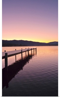 Sunrise over a dock in Lake Whatcom during Winter Bellingham Washington
