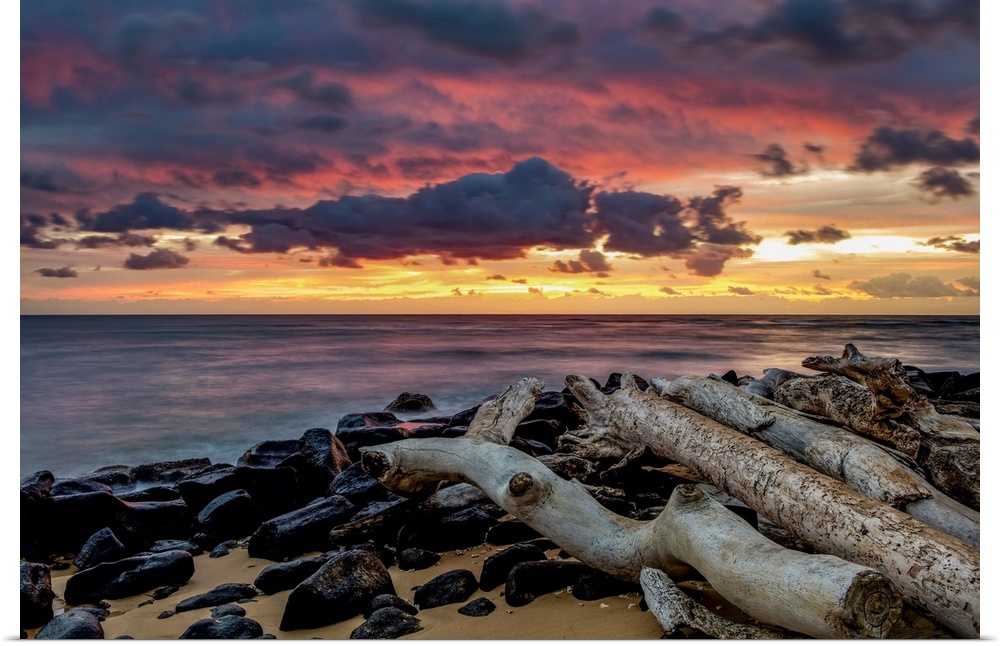 Sunrise over the Pacific Ocean from the shore of Lydgate Beach; Kapaa, Kauai, Hawaii, United States of America