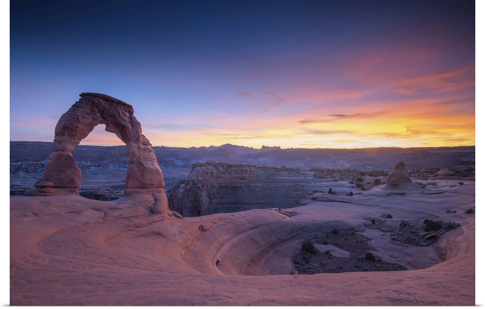 Sunset at Delicate Arch, located in Arches National Park, Utah