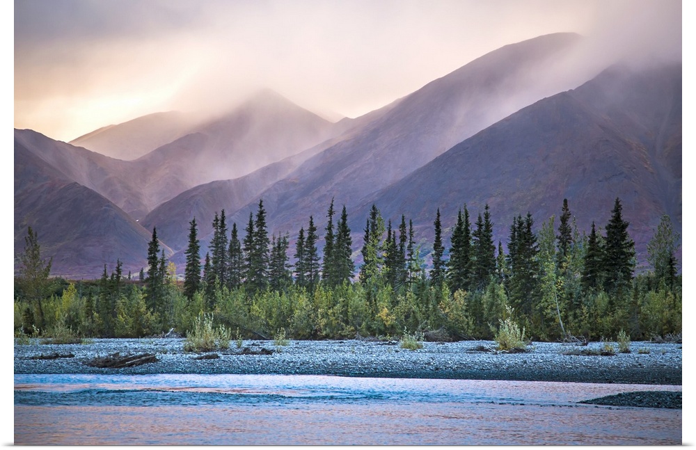 Rain and snow squalls race over the mountains during sunset on the Kelly River, in the western Brooks Range of Noatak Nati...