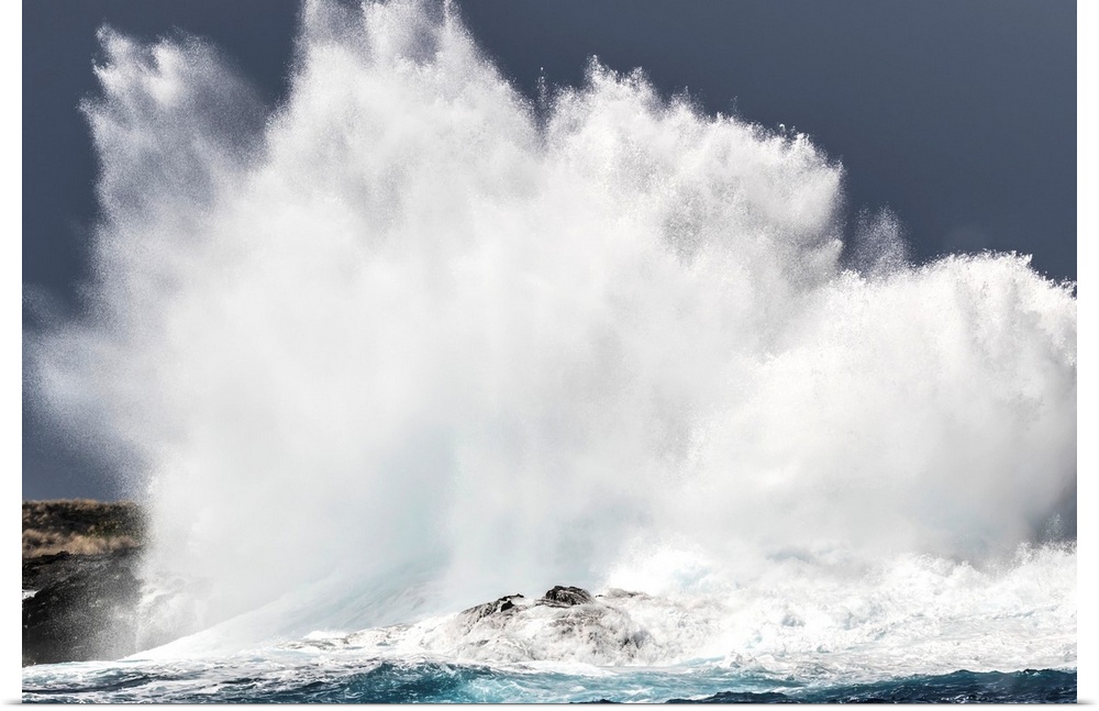 Swell induced wave crashing on the Kona coast, Kona, Island of Hawaii, Hawaii, United States of America.