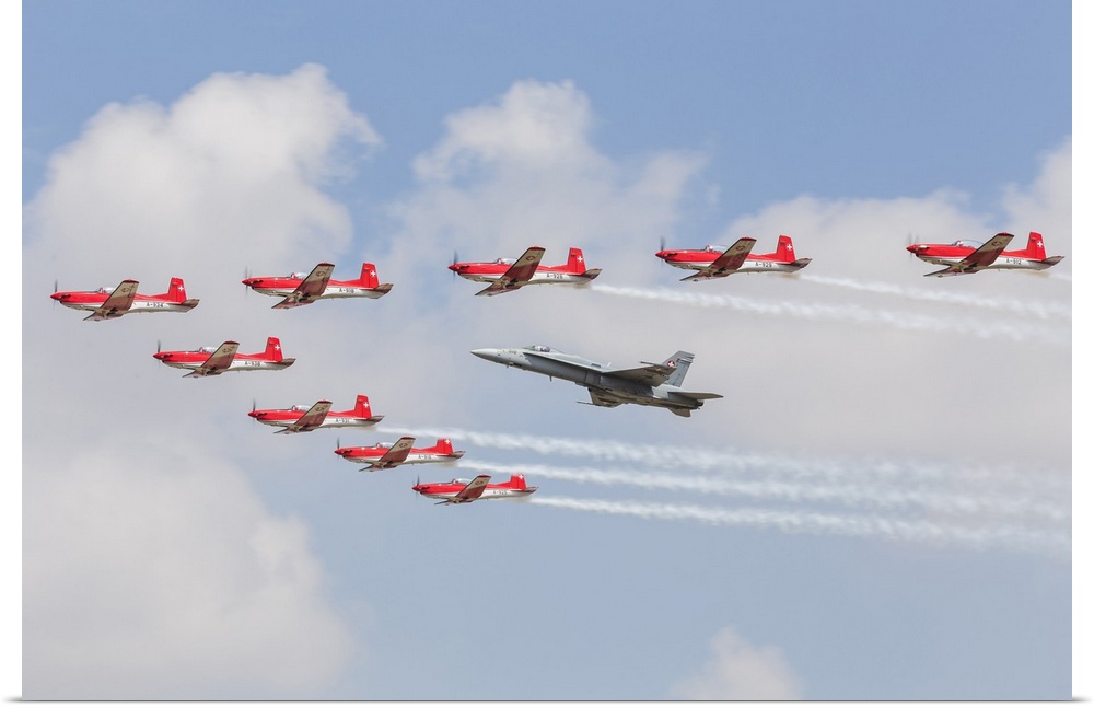 Swiss Air Force F/A-18C Hornet and PC-7 Aerobatic display team.