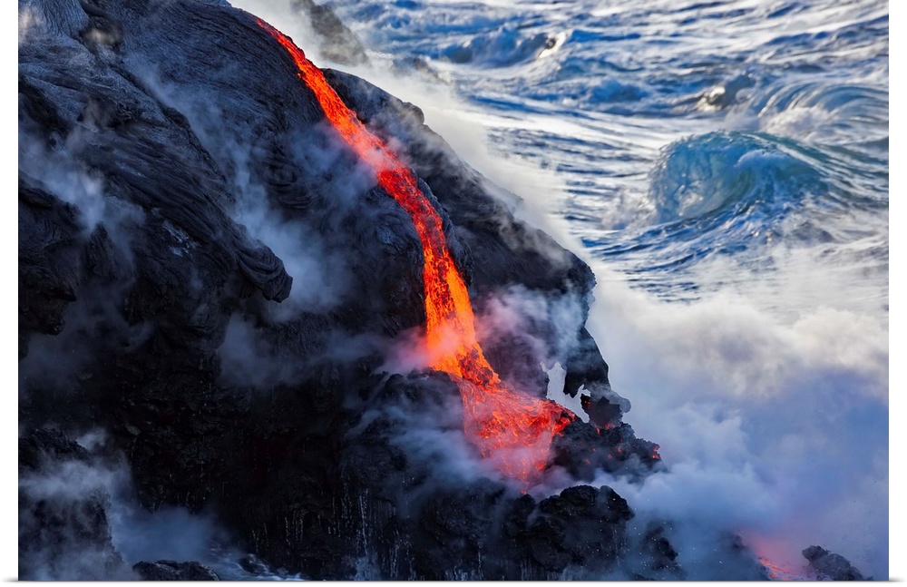 The Pahoehoe lava flowing from Kilauea has reached the Pacific ocean near Kalapana; Island of Hawaii, Hawaii, United State...