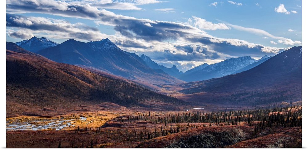Scenic autumn view of mountains and colorful tundra in Tombstone Territorial Park, Yukon Territory, Canada.