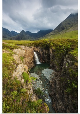 Waterfall in Coire na Creiche with hills of the Black Cuillin, Isle of Skye, Scotland