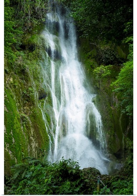 Waterfall over moss covered cliff, Tanna Island, Vanuatu