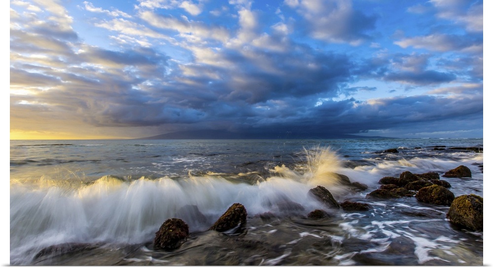 Waves hit rocks on a Pacific Beach in Maui.