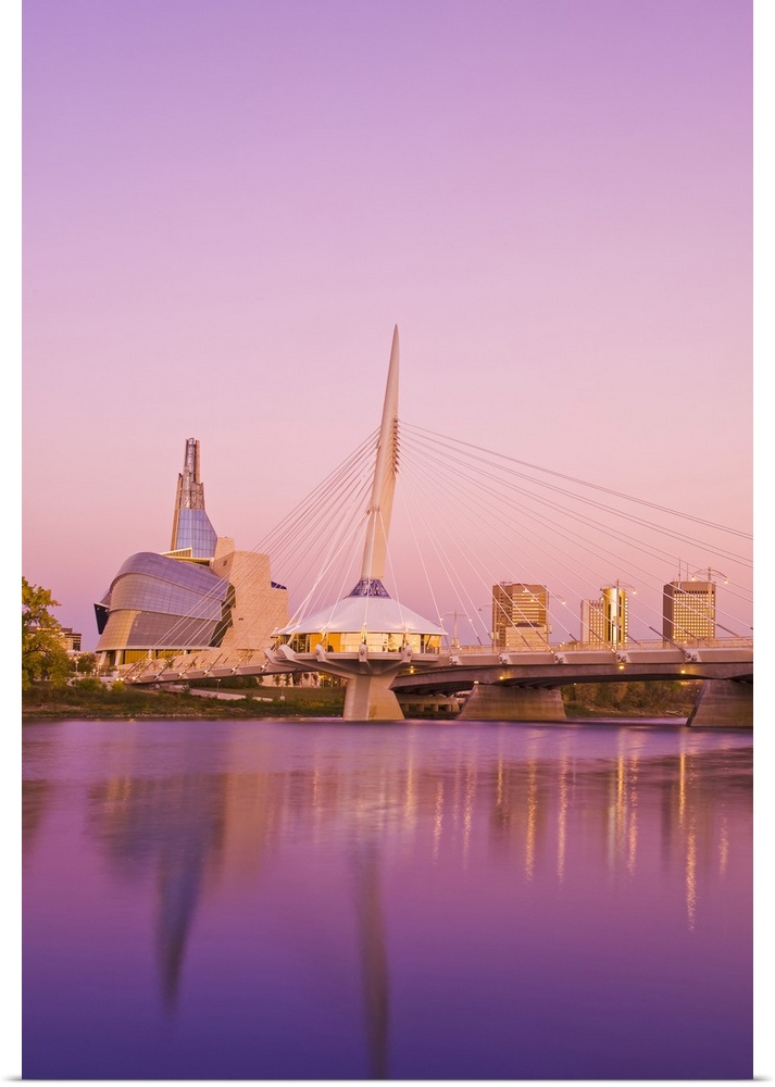 Winnipeg skyline from St. Boniface showing the Red River, Esplanade Riel Bridge and Canadian Museum for Human Rights; Winn...