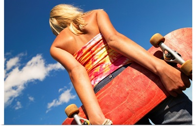 Woman Holding A Skateboard
