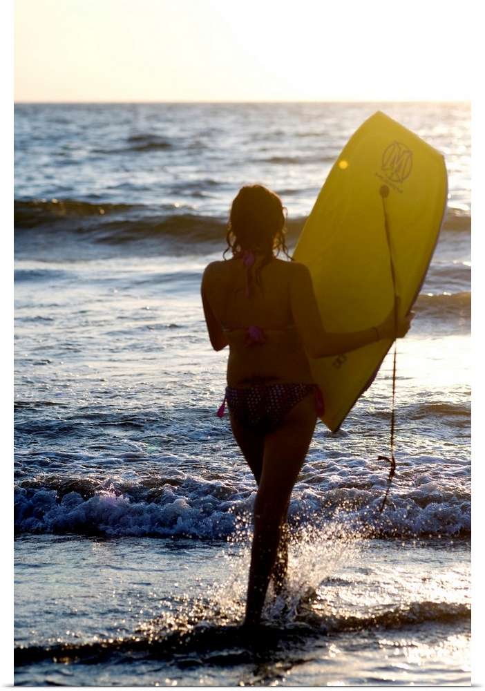 Woman On Beach Carrying Bodyboard, Puerto Vallarta, Mexico
