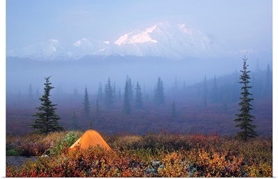 Wonder Lake campground with tent in the foreground and Denali partially osbsured by fog