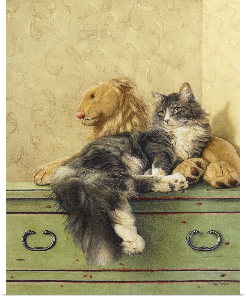 A vertical image of a gray and white cat laying on a dresser with a stuffed lion.
