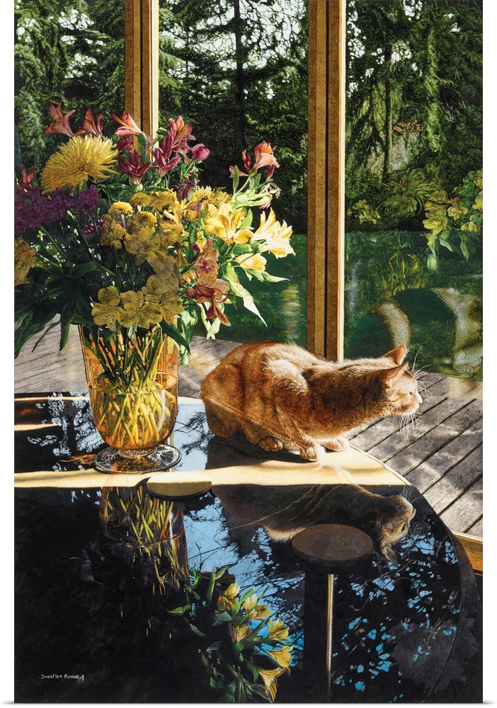 A vertical image of a yellow tabby cat sitting on a table next to a vase of flowers will looking out a window.