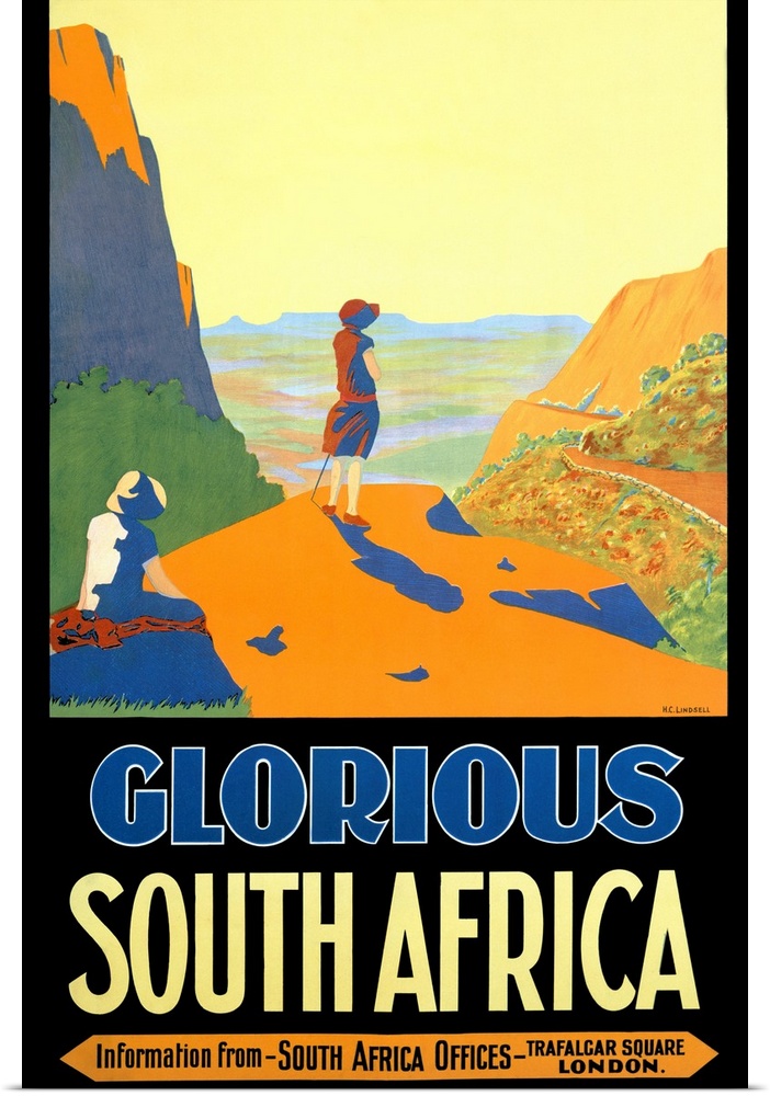 Advertising poster print of two hikers at cliff's edge overlooking ocean.