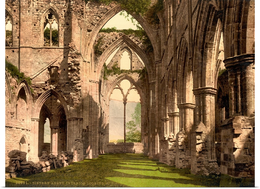 Hand colored photograph of Tintern abbey, England.