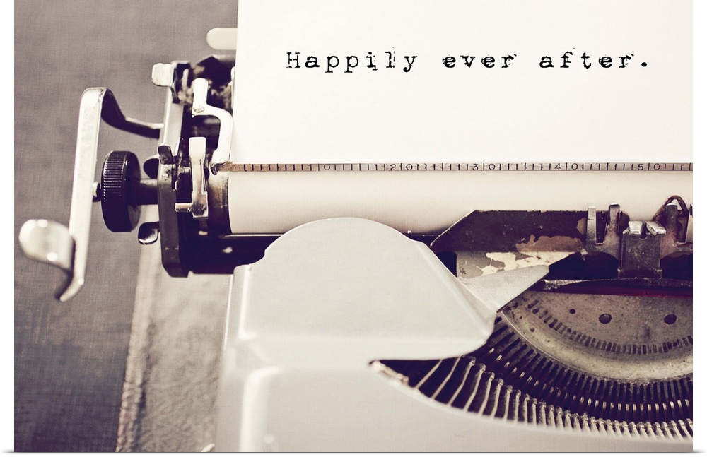 A photograph of a white typewriter with text on the paper.