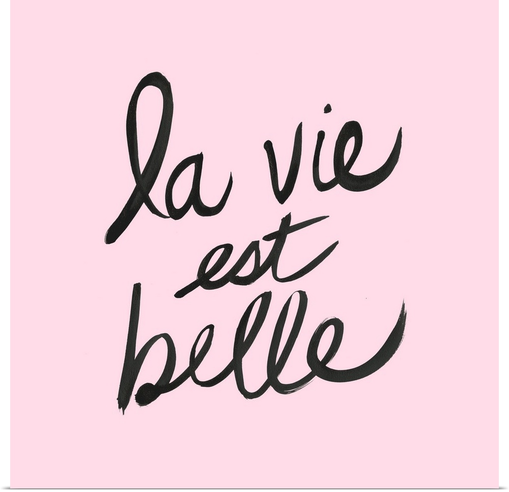 "La Vie Est Belle" hand lettered in black on a pastel pink background.
