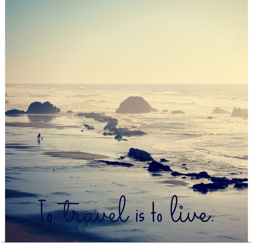 "To Travel Is To Live" written at the bottom of a square photograph of a rocky beach shore.