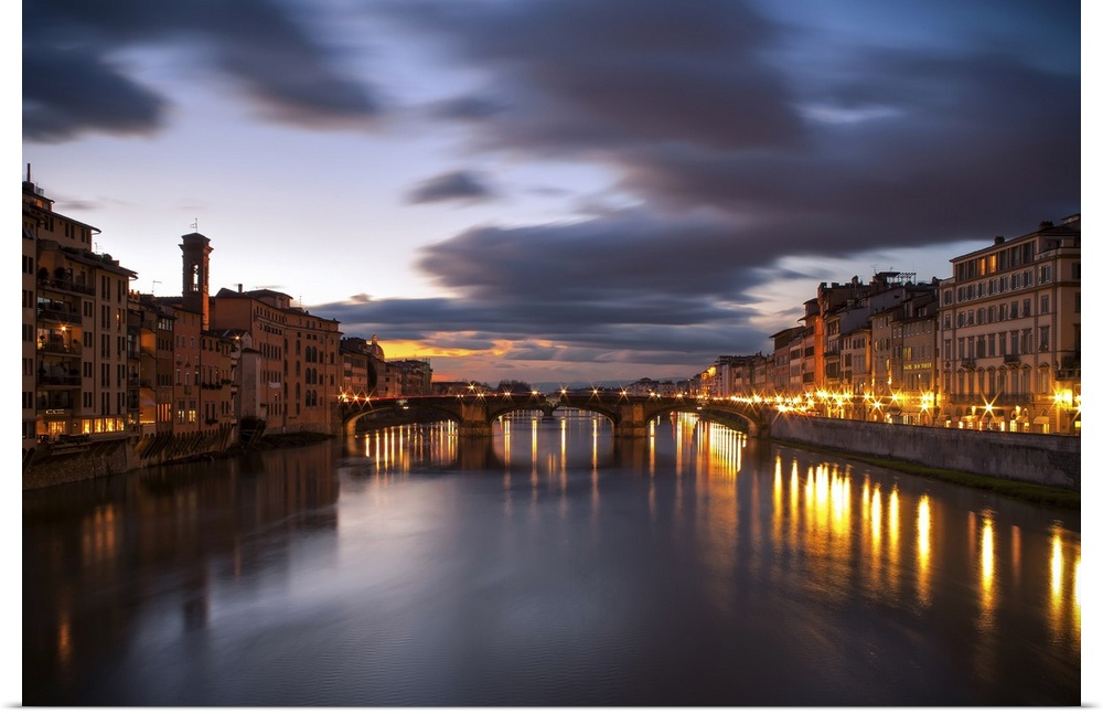 Arno, city with lights reflecting from the bridge