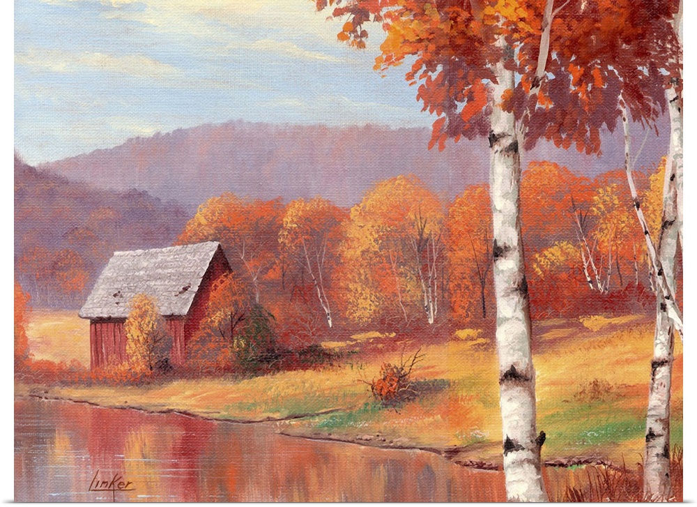 Shack by pond in front of mountain range and autumn birch trees.