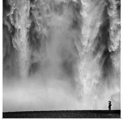 Black and White Photo of waterfall with person