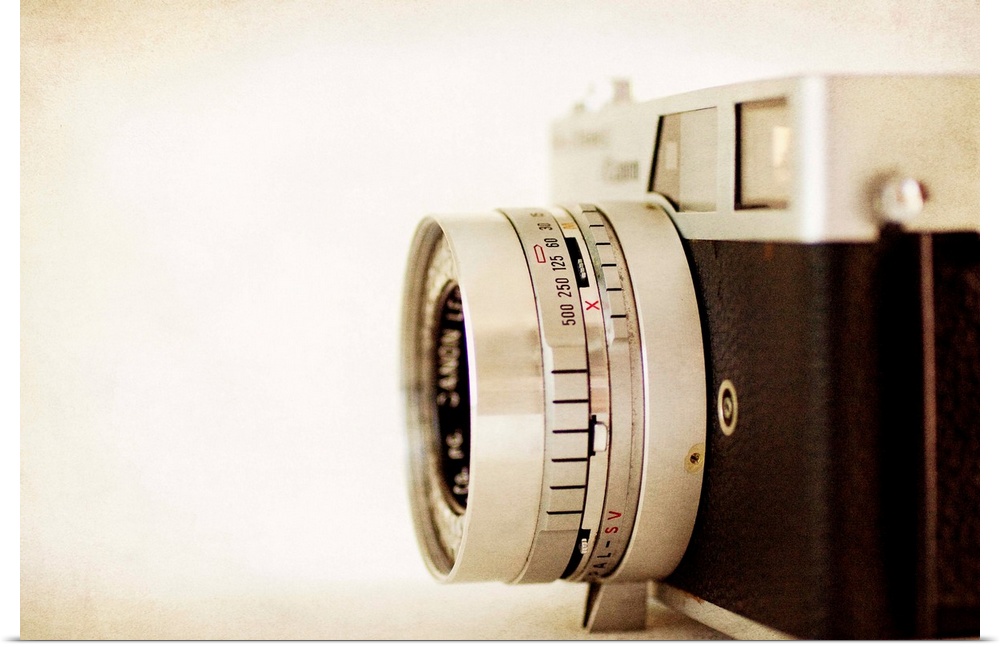 Photograph of a vintage camera with a vintage sepia look to it.