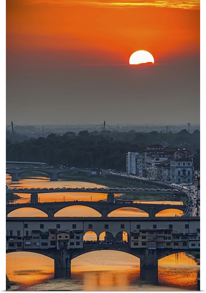Orange sky above the river and bridges, color photography
