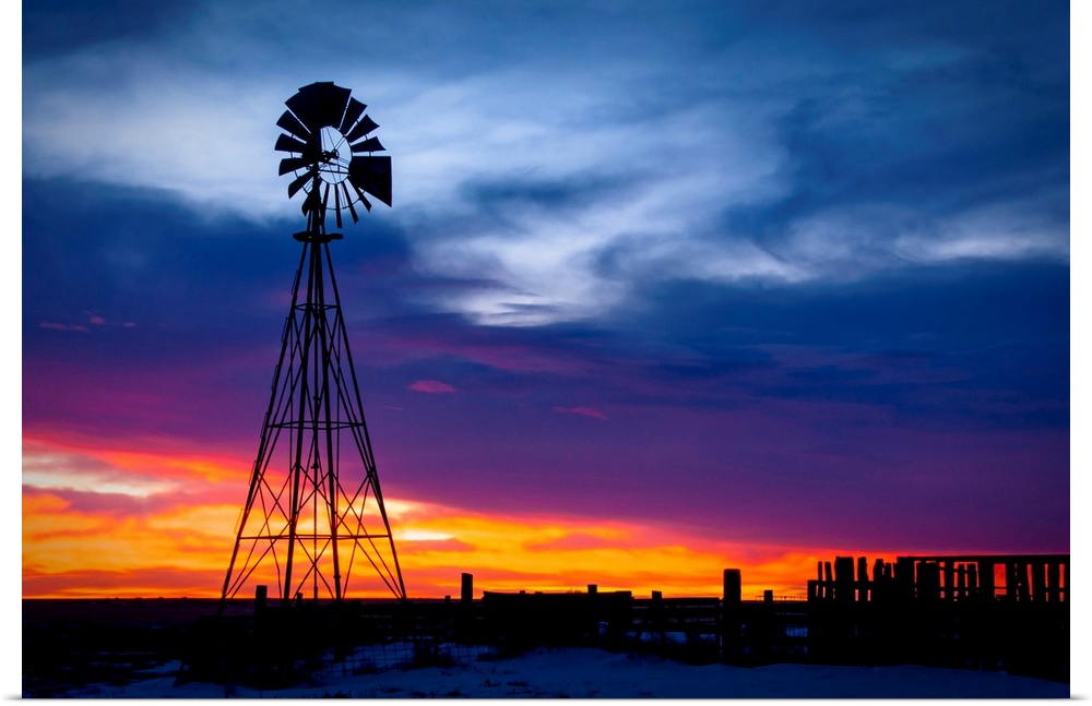 Windmill on a farm at sunrise, color photography