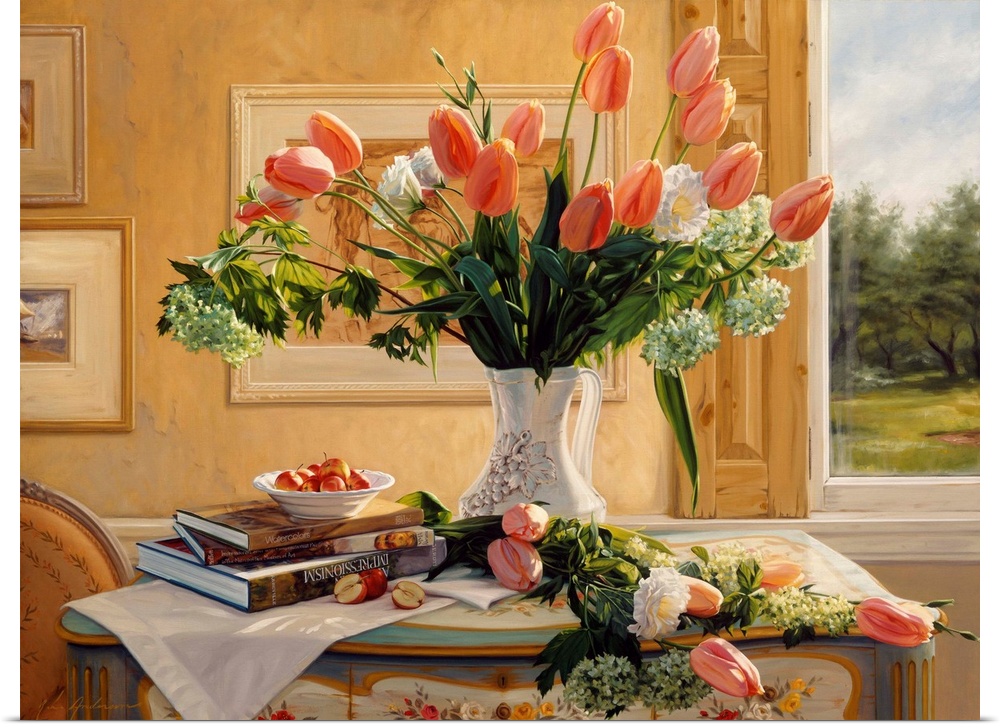 Vase of french tulips and assorted flowers on a table with books on it and a window in the background.