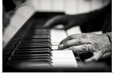 hands on a piano, black and white photography