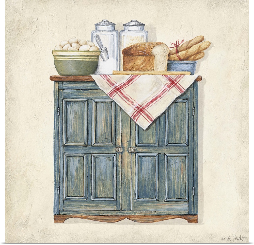 sideboard cabinet with bowl and loaves of bread