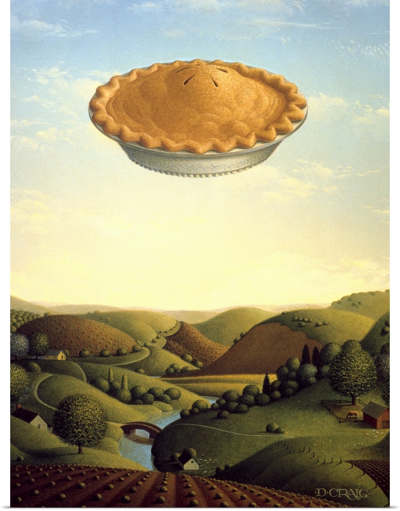 A pie floats high in the sky over a valley.